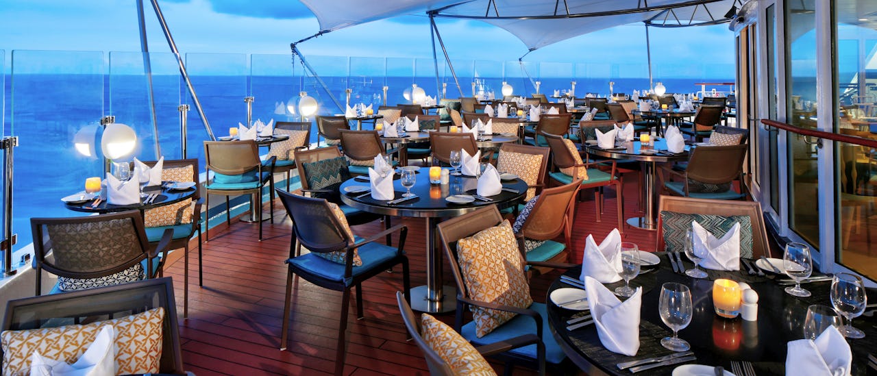 Watch the sunset while having a romantic dinner at Candles