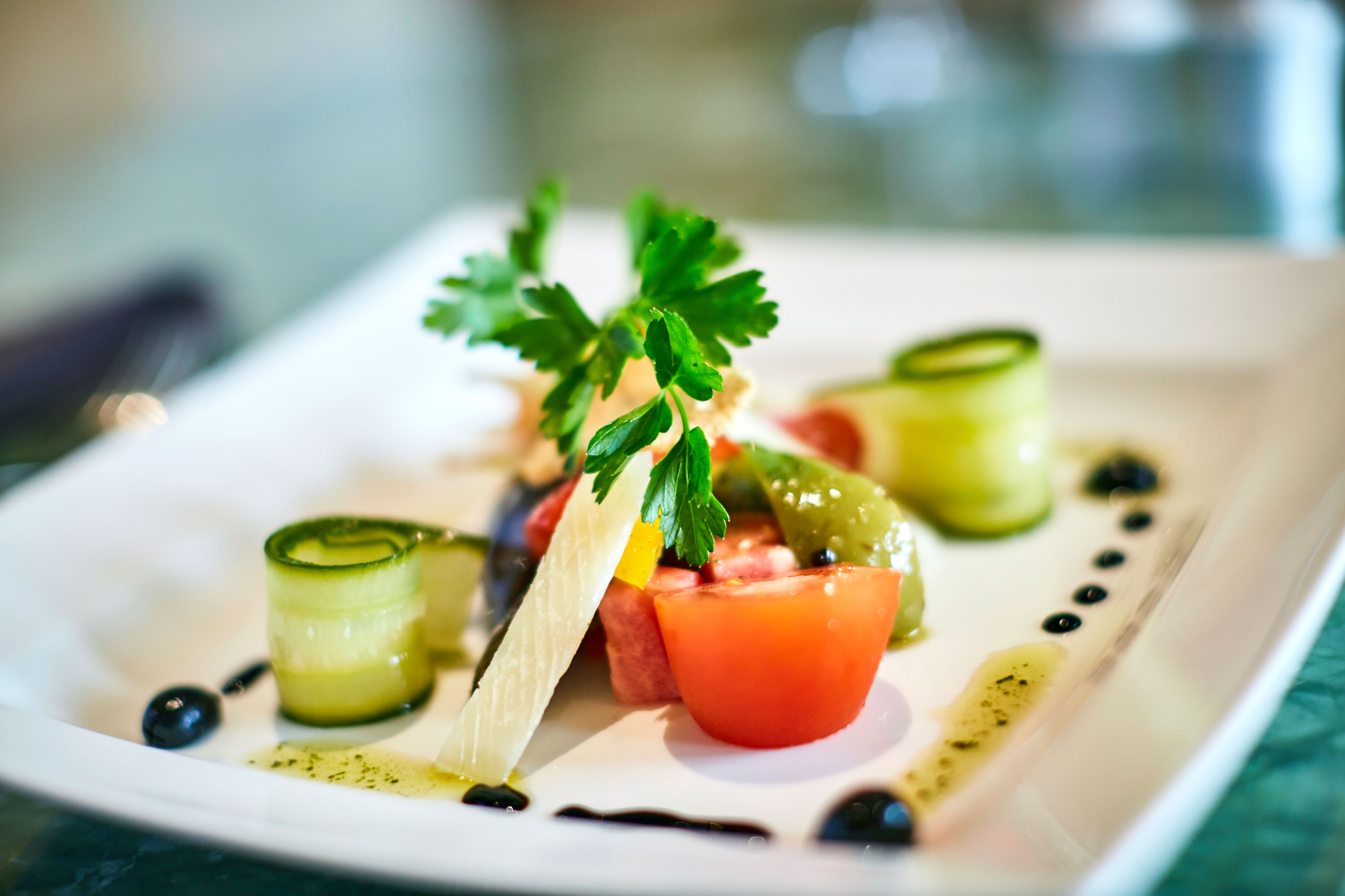 Delicious meals pared with wines selected by prize-winning expert Olly Smith at speciality restaurant The Glass House.