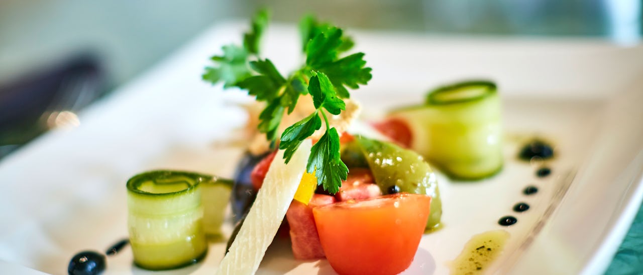 Delicious meals pared with wines selected by prize-winning expert Olly Smith at speciality restaurant The Glass House.